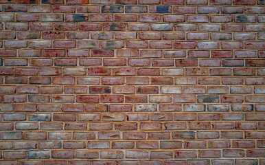 Brick wall, vintage texture. Red brick wall for construction themes. Brickwall background. Textured bricks for design projects. Solid bricks structure. Brick wall pattern. Wall from bricks.