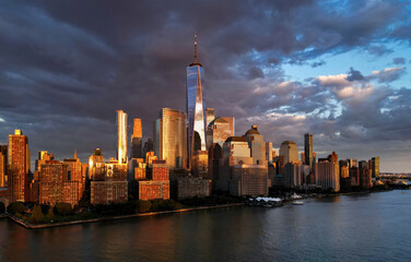 Fototapeta premium New York City photo from drone. Aerial view of New York city skyline in Manhattan. NYC, NY. American city. Manhattan skyline. Skyline of New York City. Cityscape of NYC. Famous landmarks of New York.