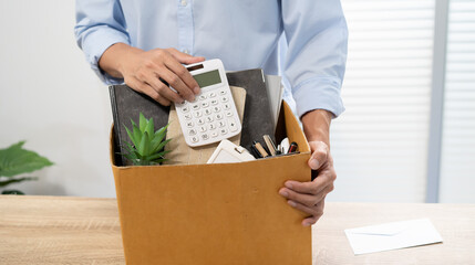 Business man sending resignation letter and packing Stuff Resign Depress or carrying business...