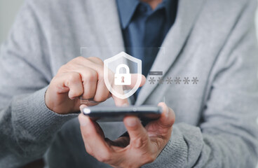 Businessman holding a smartphone, inputting a password for a secure login. A shield icon symbolizes cybersecurity, data protection, online privacy, and secure network access authentication.