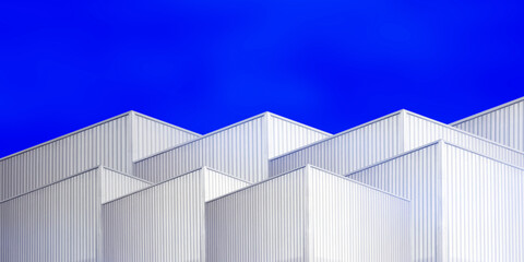 architecture design square shape corrugated wall geometric buiding. The factory warehouse is exterior decorated with corrugated texture to create a point of interest with beautyl