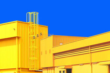 architecture design square shape corrugated wall geometric buiding. The factory warehouse is exterior decorated with corrugated texture to create a point of interest with beautyl