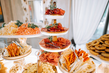 Exquisite platter of assorted snacks displayed elegantly at a festive gathering