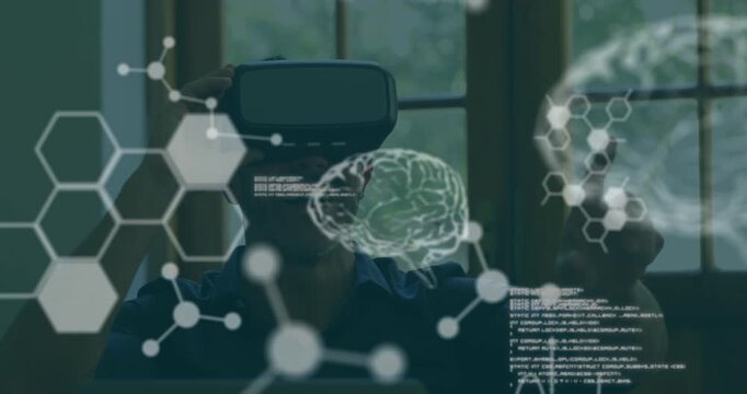 Animation of medical data processing over caucasian man wearing vr headset at home - Powered by Adobe