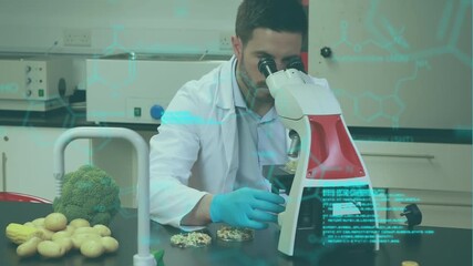 Animation of medical data processing over caucasian male scientist using microscope at laboratory - Powered by Adobe