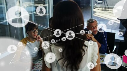 Animation of network of connections with people icons over diverse business people - Powered by Adobe