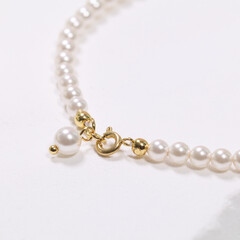 pearl bracelet on white background