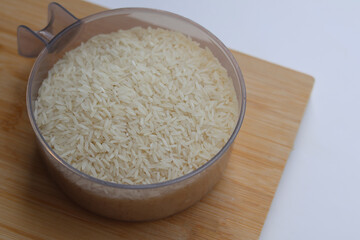 Side view of Top vie of Rice, jasmine rice served in a bowl. White background. Rice is a staple food of Thailand.