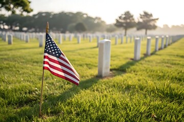 American Flag in Peaceful Cemetery With White Headstones at Sunset


