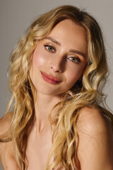 Naklejka premium Beauty shines through in a modern portrait of a stylish blonde woman with captivating features