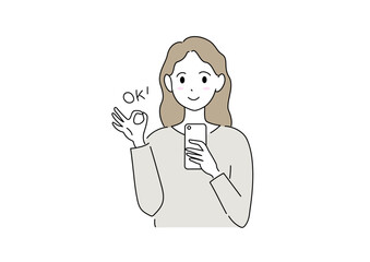 スマホを持ちOKをしている女性