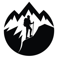 A hiker on a mountain peak