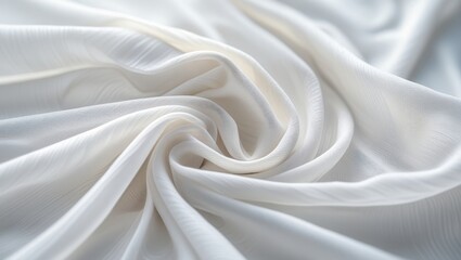 Obraz premium Close-up view of flowing, elegant white fabric, showcasing subtle texture and soft folds.