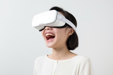 Japanese girl using vr portrait smiling white background.