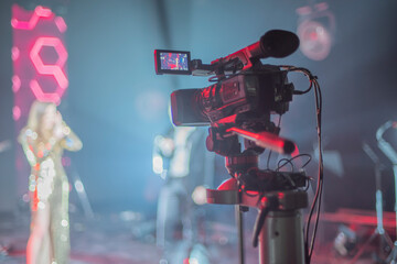 cameraman broadcasting at a music concert