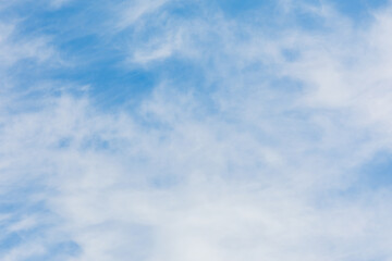 Thin Clouds Spreading Across a Bright Blue Sky