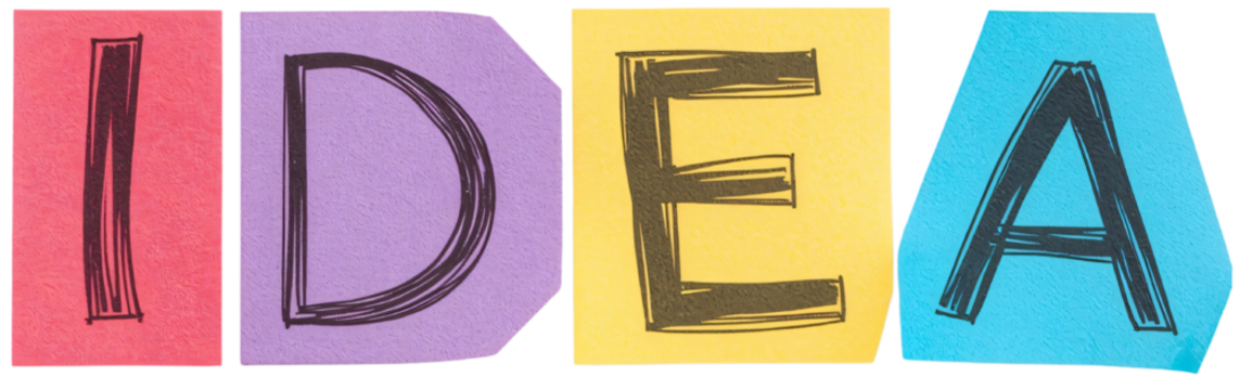 Colorful paper notes spell IDEA; brainstorming