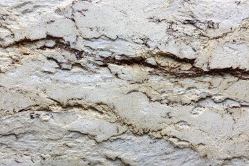 Close-up of textured light beige stone