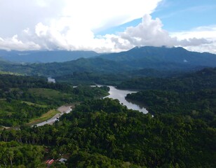 Naklejka premium Lush valley with river and mountains