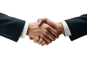 Two businessmen in suits shaking hands in agreement against a dark background