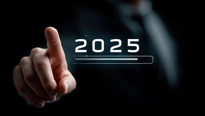 Hand points at a digital 2025 loading screen