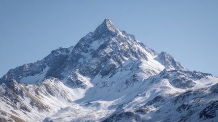 Majestic Snowy Mountain Peak Against Clear Blue Sky Breathtaking Scenery