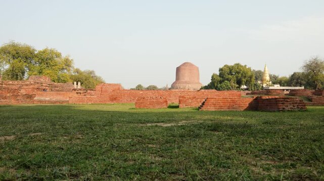 ancient buddhist monument dhamek stupa at sarnath near varanasi in daylight video is taken at Sarnath near Varanasi, India.