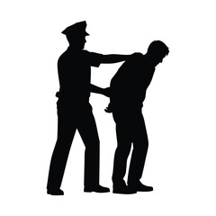 Silhouette of a police officer arresting a man