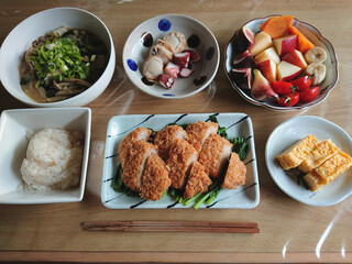 A Japanese set meal of pork cutlet set meal made with pork fillet with desserts / 豚のひれ肉を使ったとんかつ定食の和食御膳(デザート付き)