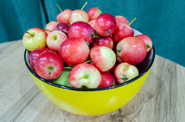 fresh red apples in a bowl