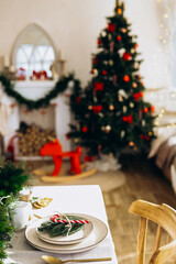Cozy holiday dining setup with festive decorations in a warm room