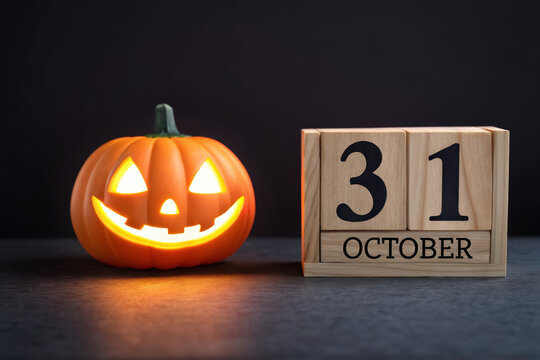 Halloween Date 31 October with Smiling Pumpkin on Dark Background for Seasonal Celebration and Event Promotion