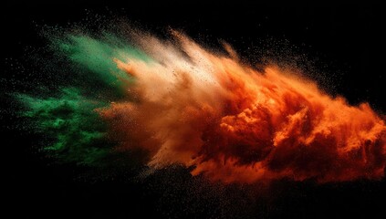 Colorful powder explosion against black background