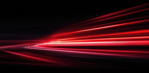 Abstract image of red light streaks, suggestive of motion and speed