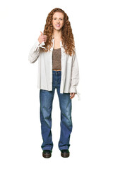 Full-body redhead portrait smiling and raising thumb up