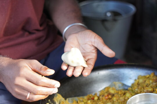 Hands Preparing Stuffed Dumpling