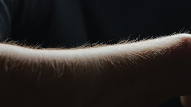 Growing hair on the trunk macro video.
Hairy male arm close-up in this video.
Strong hair growth on the body of an adult man and increased testosterone levels.
Puberty in a teenager