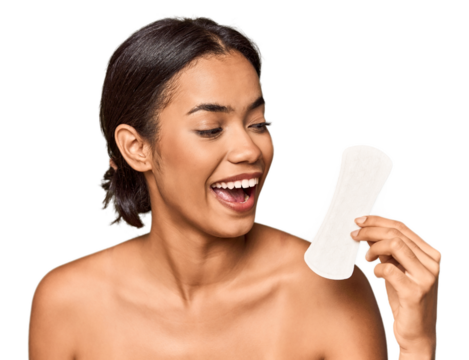 Filipino woman with sanitary pad in studio points with thumb finger away, laughing and carefree.