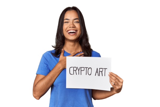 Woman with "crypto art" sign in studio laughs out loudly keeping hand on chest.