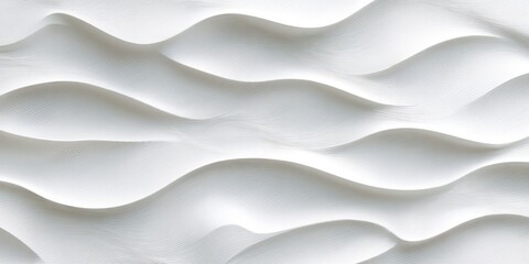 Fototapeta premium A close-up photograph showcases a textured, white surface resembling undulating waves or dunes. The image is predominantly black with the white form dramatically contrasted against it, 