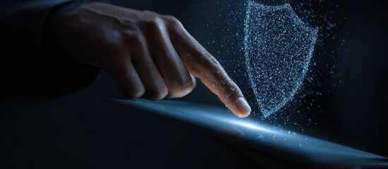 A hand hovering over a digital shield graphic