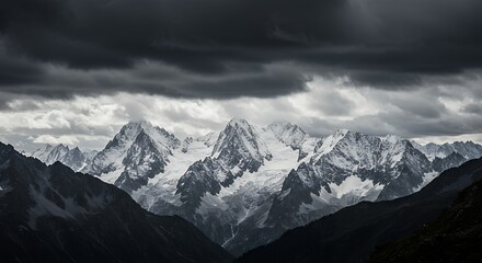 Majestic mountain range under stormy sky