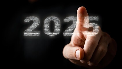 A hand points to the year 2025, composed of data-like elements