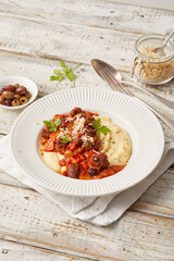 Polenta with tofu and tomato sugo