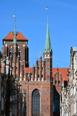 Fototapeta premium Gdansk, Poland. Mariacka street. St. Mary's Church or formally the Basilica of the Assumption of the Blessed Virgin Mary - brick gothic catholic church located in Gdansk