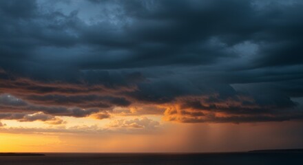 Fototapeta premium Dramatic sunset sky with dark clouds
