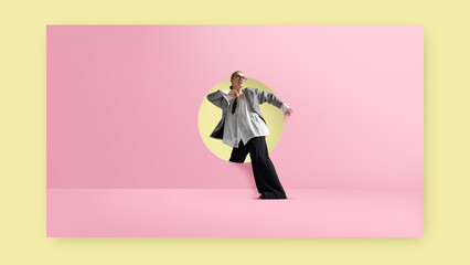Contemporary collage. Businesswoman stepping through round doorway on pink wall with stylish oversized outfit. Concept of fashion freedom, career change, individuality, web design 2.0.
