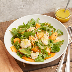 Mozzarella melon arugula salad