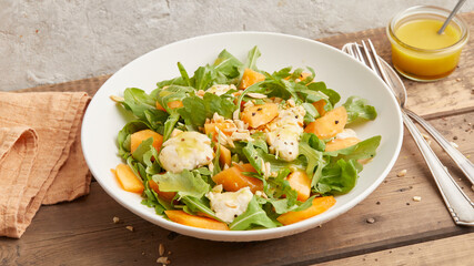 Mozzarella melon arugula salad