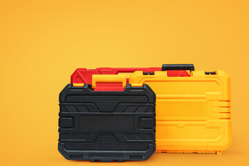 Durable plastic toolboxes on vibrant orange background